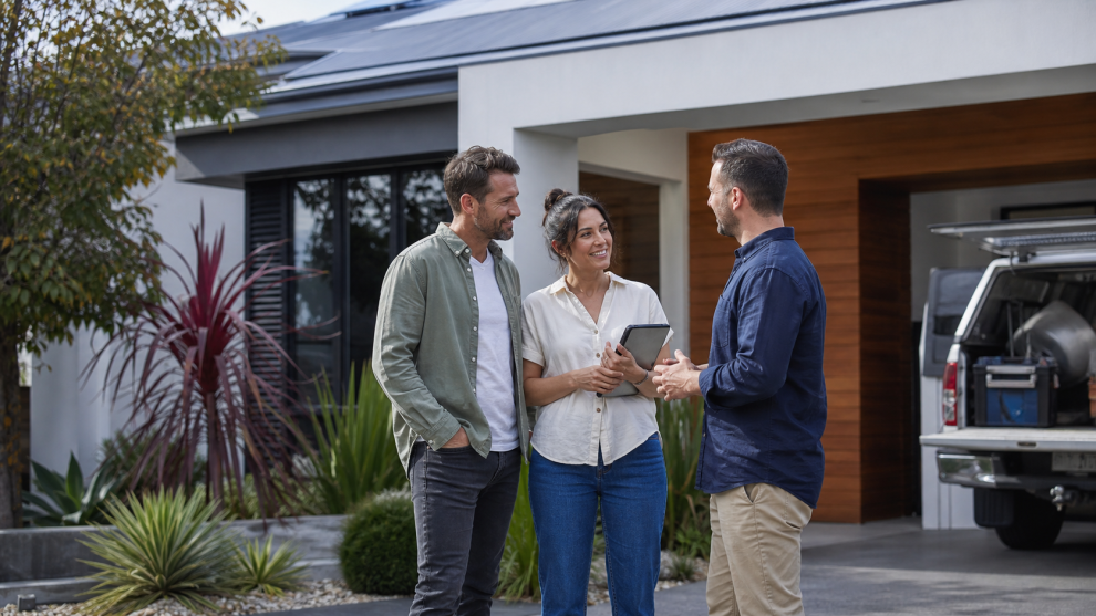 Self employed Australian borrowers discussing a home loan outside their home